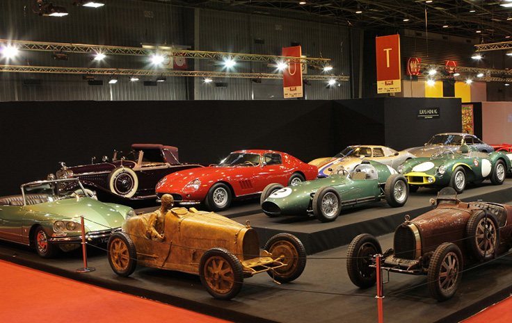 Racing cars of the 1920s and 1950s on the 2014 stand