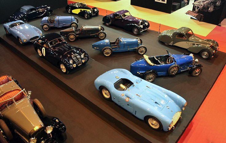 Bugatti automobiles and a light blue sports car, 2015