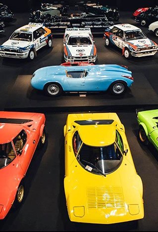 A yellow Lancia Stratos on the 2019 stand